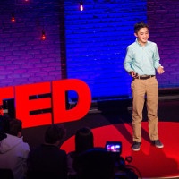 Ashton Cofer presents on the TED stage